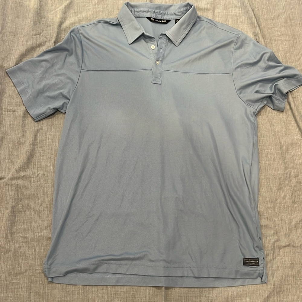 Light blue Travis Mathew’s golf shirt size large